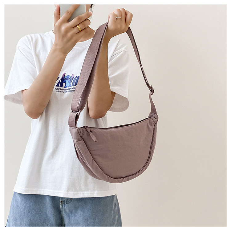 斜挎包女新款单肩包学生女包休闲包运动小包夏季帆布包日系饺子包详情22