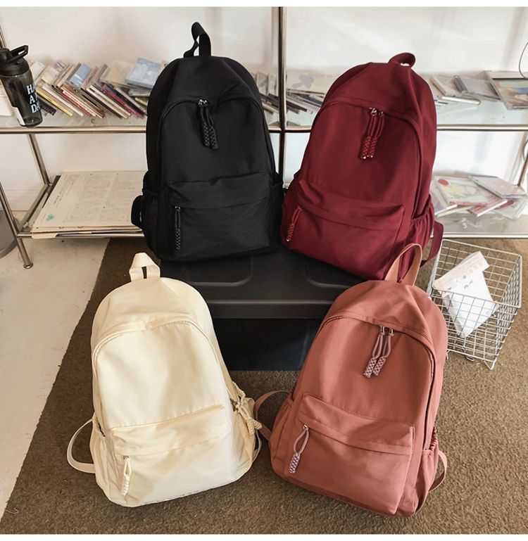 贝尔书包女生大学生简约黑色大容量初中生高中2024新款背包双肩包详情14