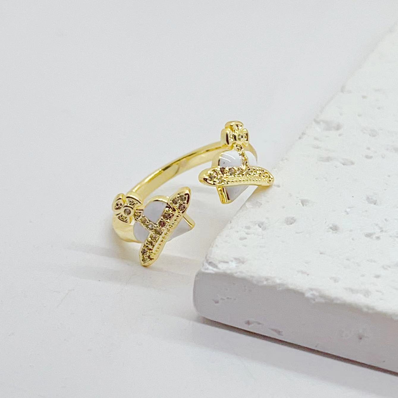 This cross-border e-commerce product features a unique and niche design for women. The oil drop ring has an adjustable opening. It is an event ring with 18K copper plating pic 5