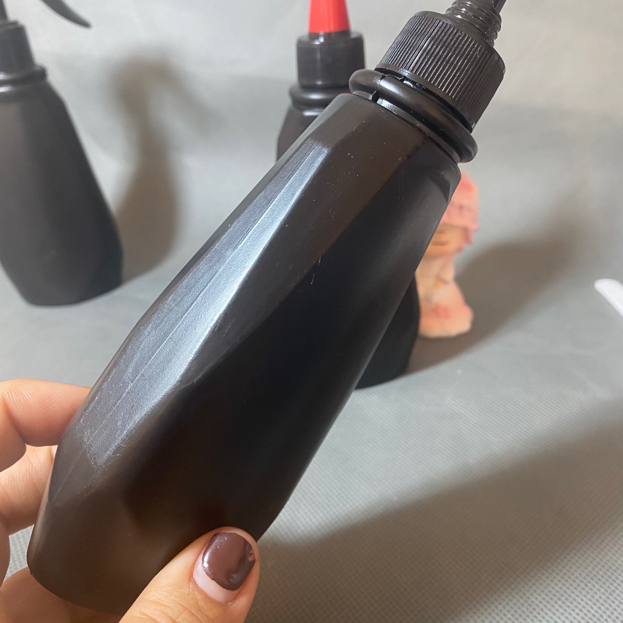 尖嘴清洁瓶洗衣液尖嘴瓶pe胶水瓶衣物清洗剂瓶200克详情3