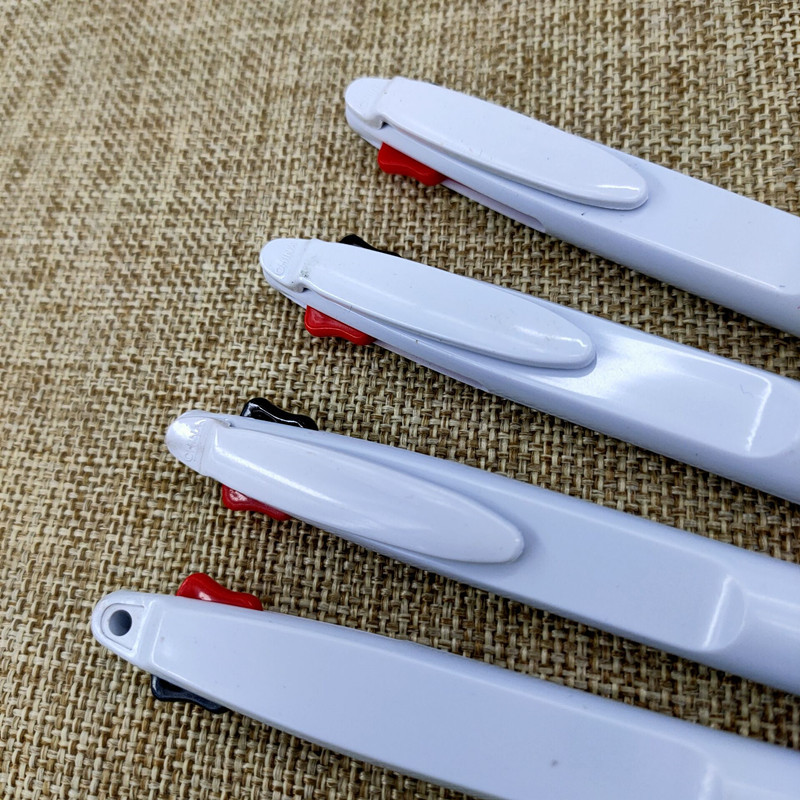 Wholesale four-piece set of dual-purpose oil pens, black and red ballpoint pens, smooth writing, black and red pen refills pic 3