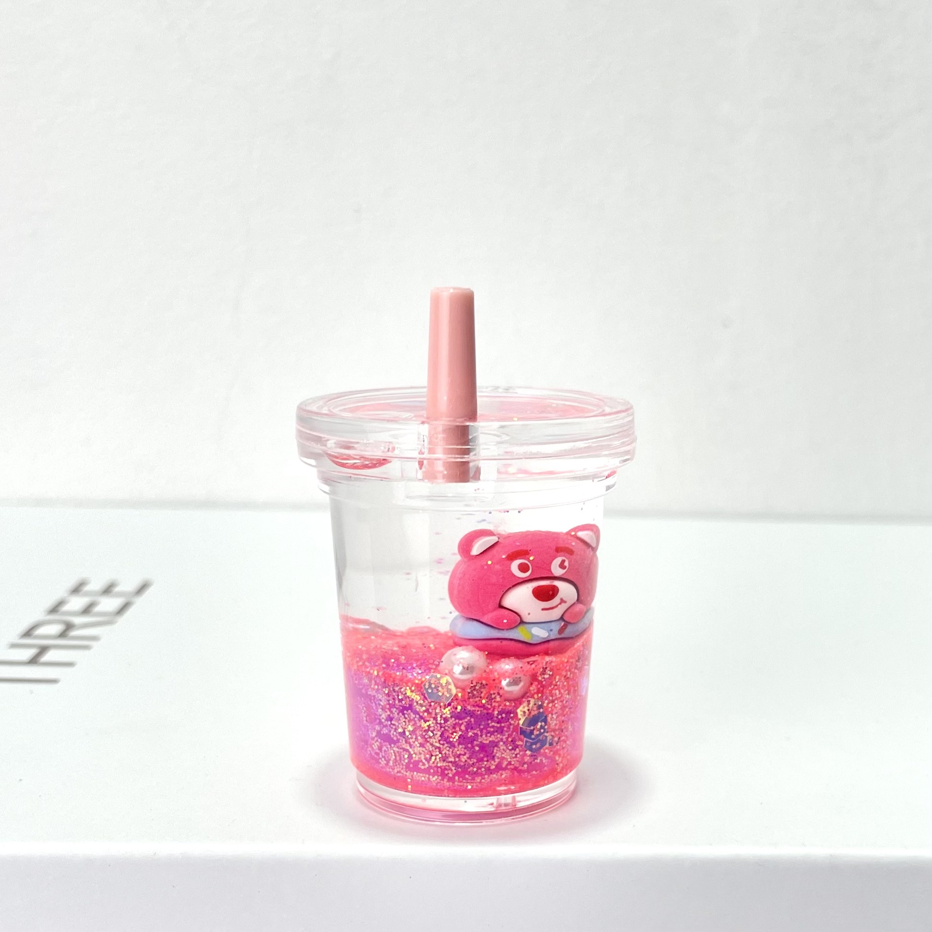 Luminous strawberry bear oil flowing sand bottle liquid pendant, hanging piece, acrylic keychain, key chain accessories wholesale pic 4