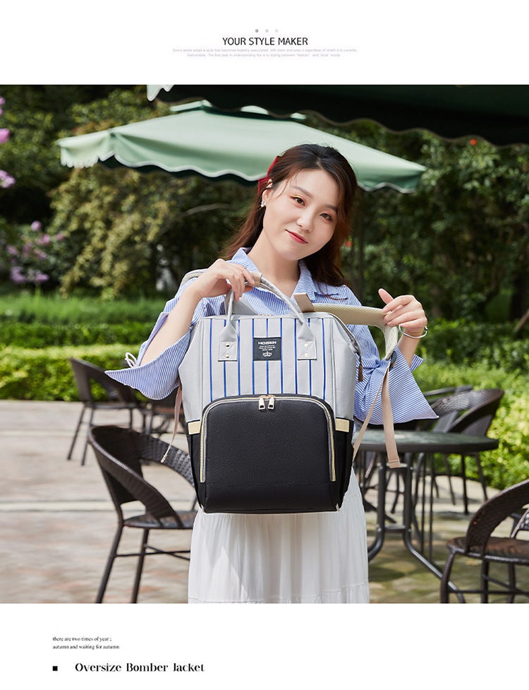 The 2021 new simple and fashionable striped mother and baby backpack can be hung on a stroller, a multi-functional mom bag, and a large-capacity maternity bag pic 21