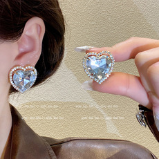 Wholesale of popular brushed frosted stud earrings for women with a light luxury and high-end InS-style, golden round stud earrings in the style of love beans pic 10