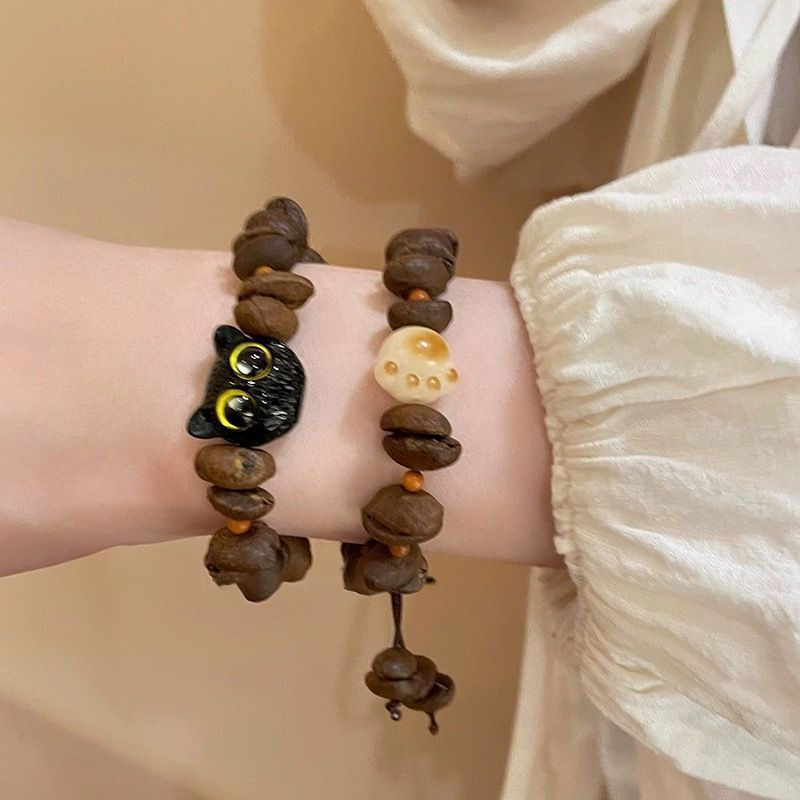 Charcoal-burned cat paw cat bracelet, female imitation white jade Bodhi seed, playful, soft Bodhi hand-held bracelet, live-streaming accessory pic 17