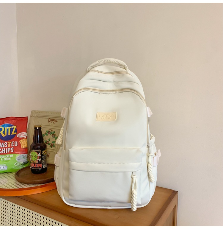 书包大容量高颜值初高中生新款双肩包大容量纯色简约防泼水背包详情39