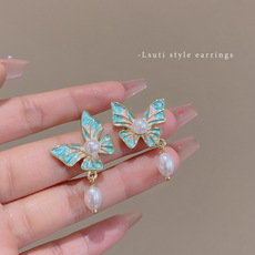 银针不对称栀子花耳环女设计感小众百搭珍珠耳钉冷淡风气质耳饰品详情6