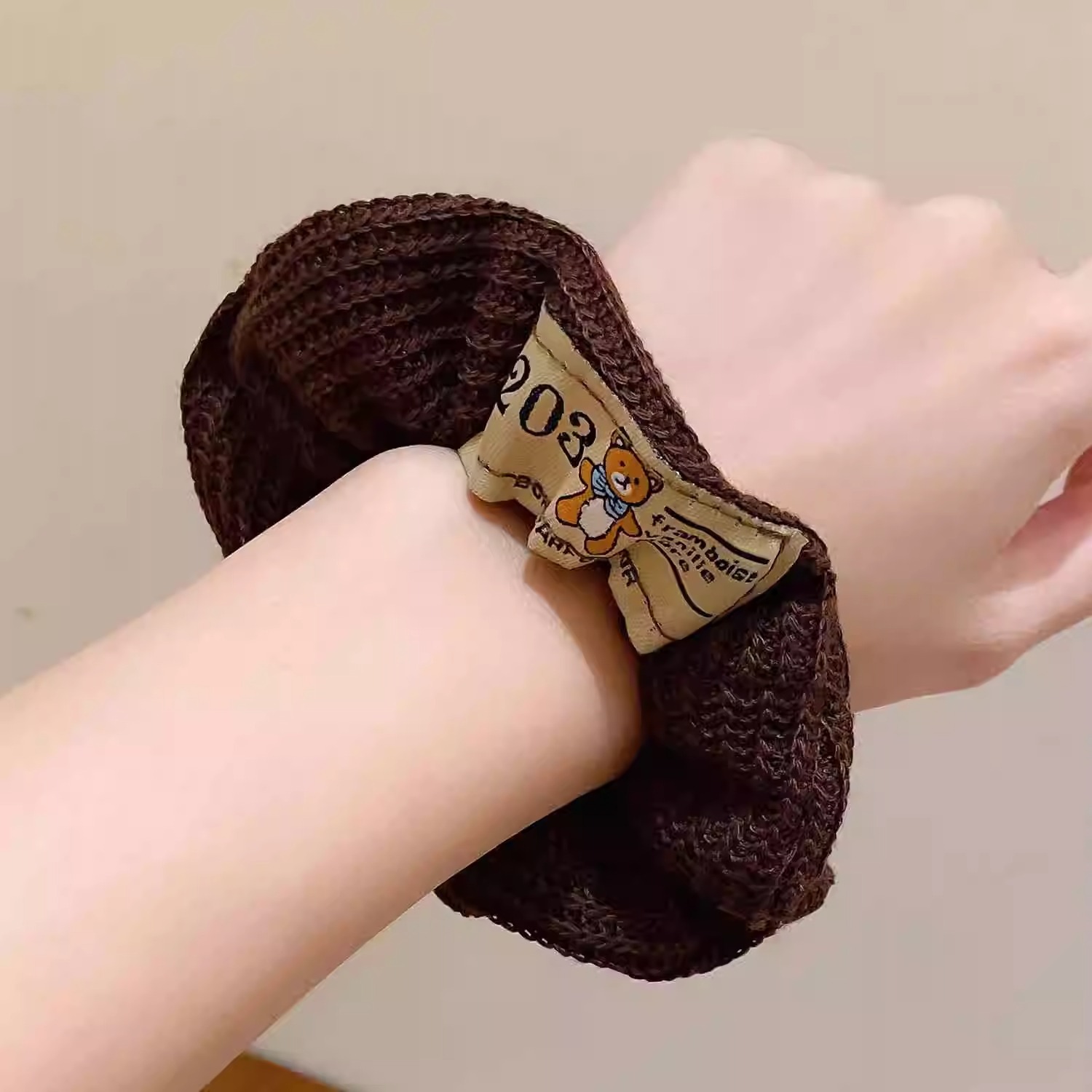 A retro French large intestine hair band for a woman with a simple and elegant ponytail bun. A hair tie, hair band, hair band and hair accessory for a woman pic 1