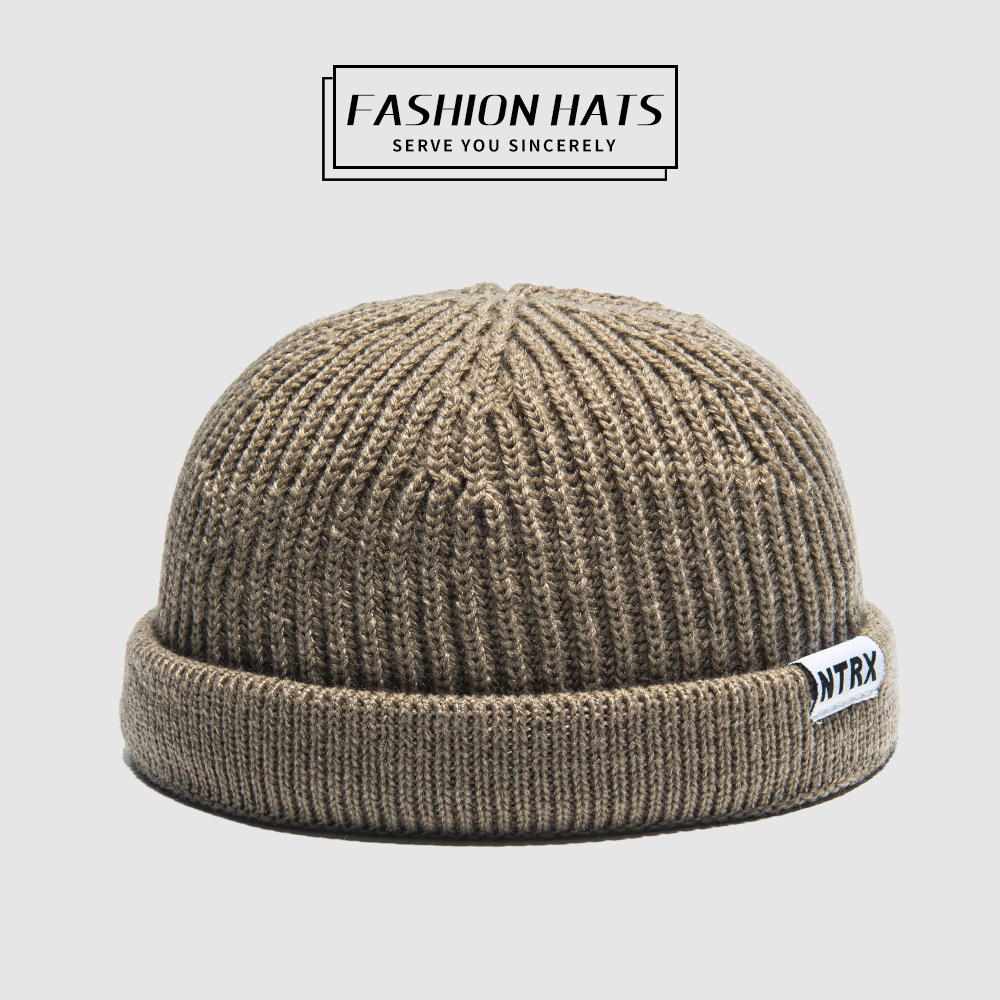 For the autumn and winter of 2021, men and women are wearing Korean-style outdoor casual hats without brims, with rolled edges and round top warp knitted caps pic 9