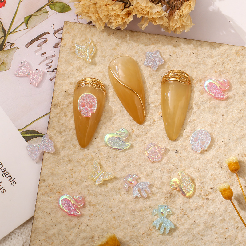 美甲夜光蝴蝶狐狸金鱼天鹅五角星皇冠骷髅头镀彩AB幻彩混色指甲钻详情1