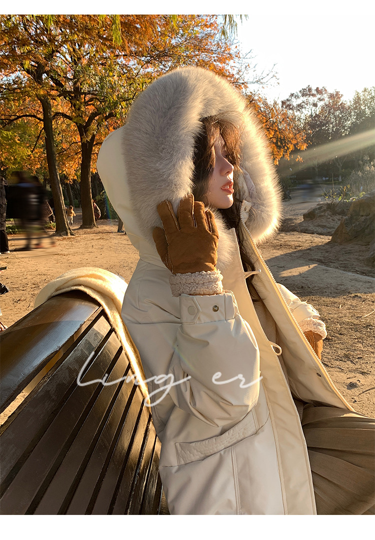 Wholesale of high-end mid-length down jackets for women that reach the knees in 2022, featuring a fashionable design sense and a niche thickened coat pic 34