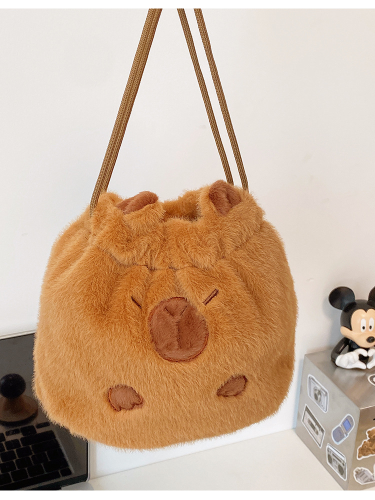 ✅ Cute plush kapibara drawstring pocket travel cosmetics camera polaroid storage bag hand pic 10