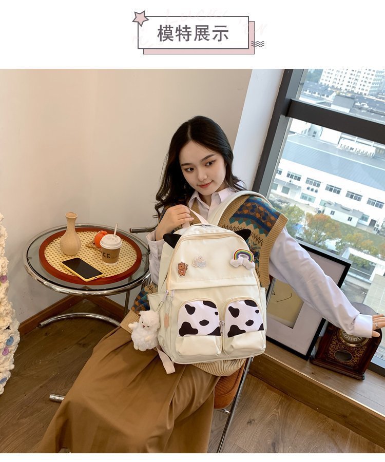 Japanese-style ins campus school style, fresh and cute, cute cow with earbuds, soft girl schoolbag, funny student backpack pic 3