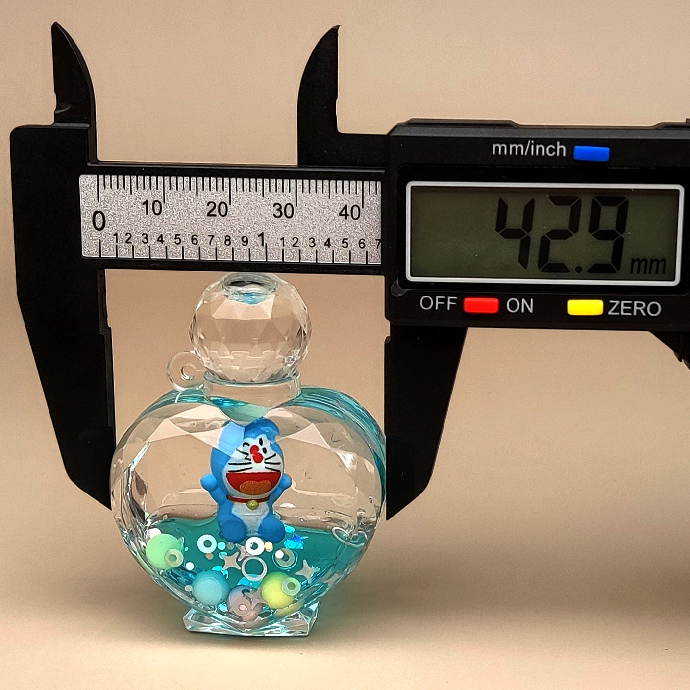 创意亚克力入油流沙瓶蓝色卡通钥匙扣香水汽车配饰桌面摆件饰品详情17