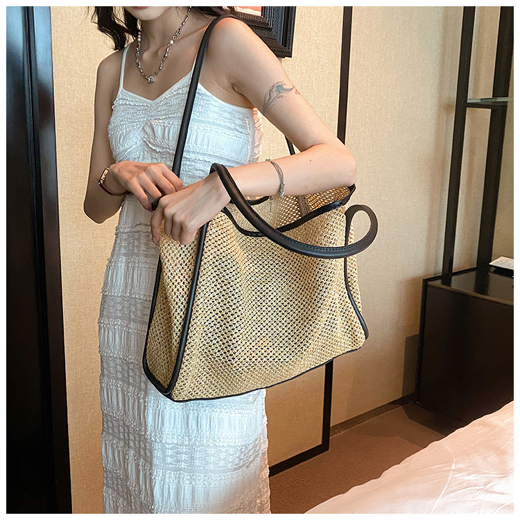 今年流行大容量草编包包女2023新款时尚通勤单肩包夏天编织水桶包详情22