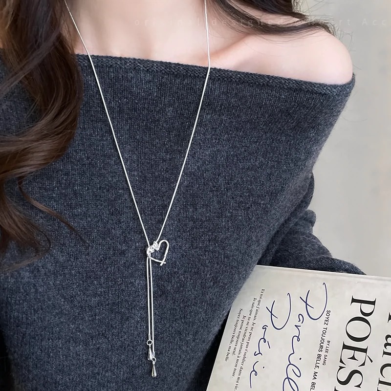 Cold and simple pull-out silver titanium steel snake bone necklace for women, 2025 new style, light luxury and high-end long sweater chain pic 10