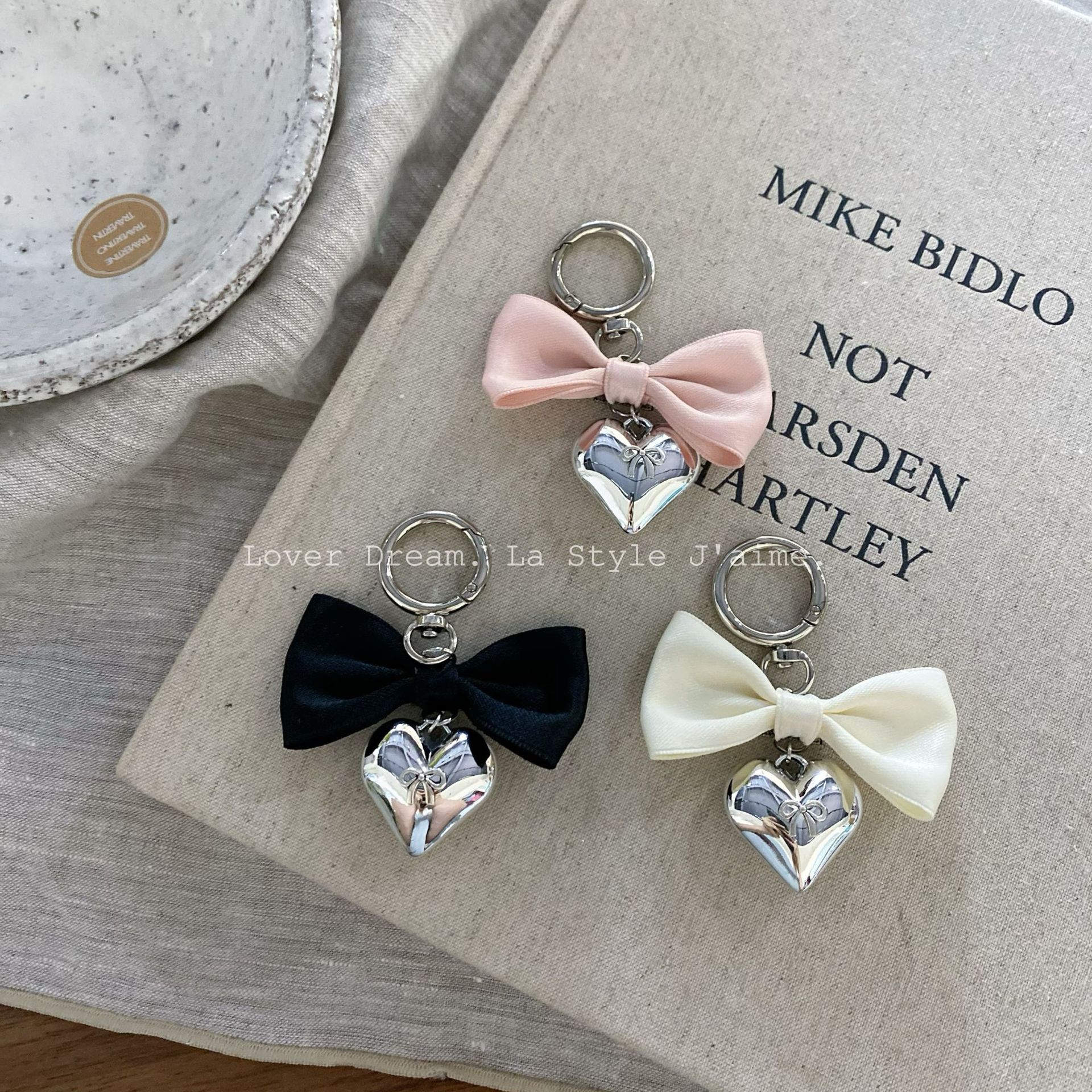 A new high-quality black polka dot heart-shaped bow headband from South Korea, sweet and fashionable headband, versatile hair accessory pic 6