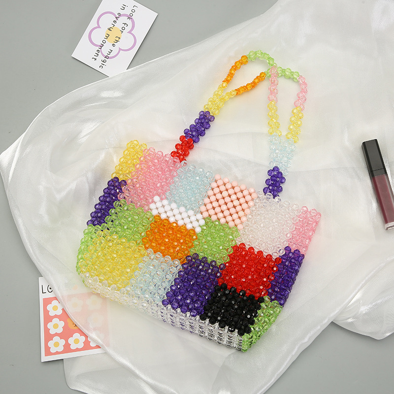 Creative color-blocking hand-held pearl bag, Japanese and Korean internet-famous hand-woven bag, pearl woven handbag, elegant decorative storage bag, and other hair accessories pic 3