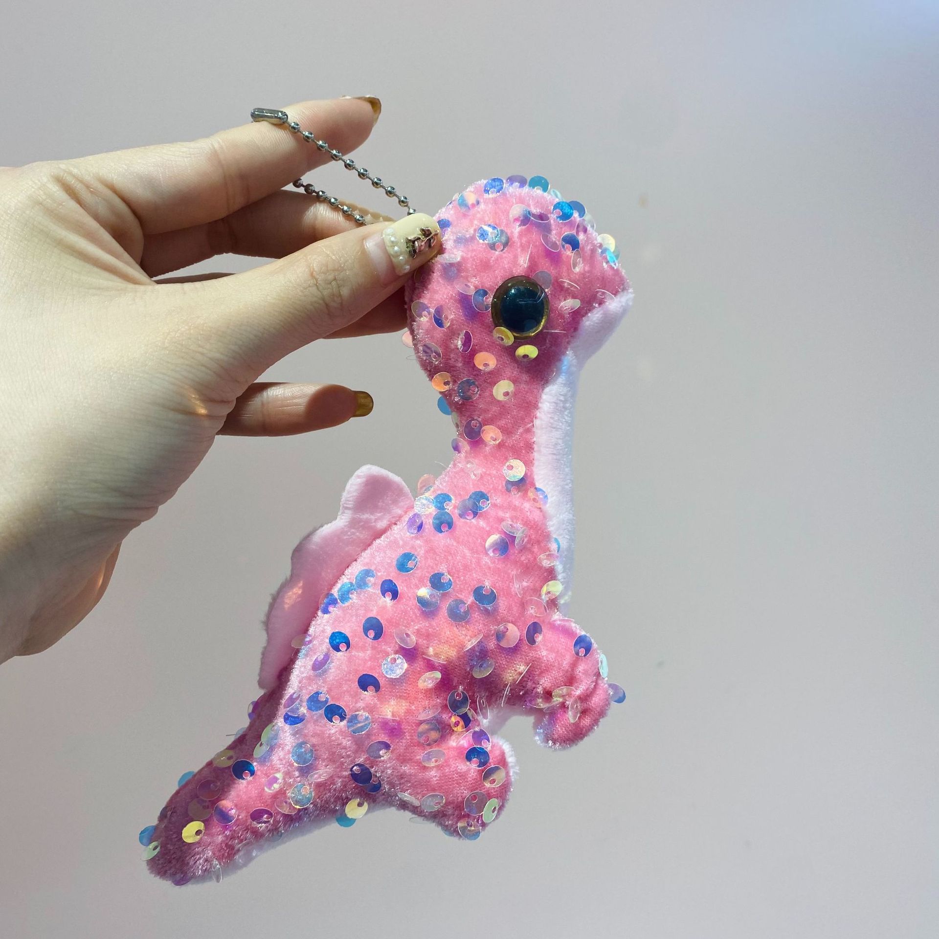A cute plush keychain and cartoon animal car backpack pendant with sequins, big eyes and little dinosaurs pic 6