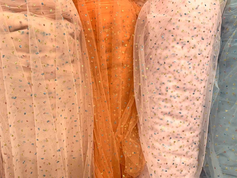 Wholesale of knitted mesh fabric for clothing, toys, puffy skirts, headwear, hair accessories, butterfly knot mesh fabric, and three-color mesh gauze pic 13