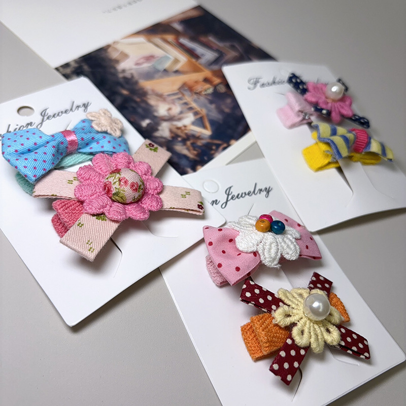 韩版卡装边夹蕾丝布艺蝴蝶结发夹少女儿童发饰可爱波点发夹刘海夹详情1