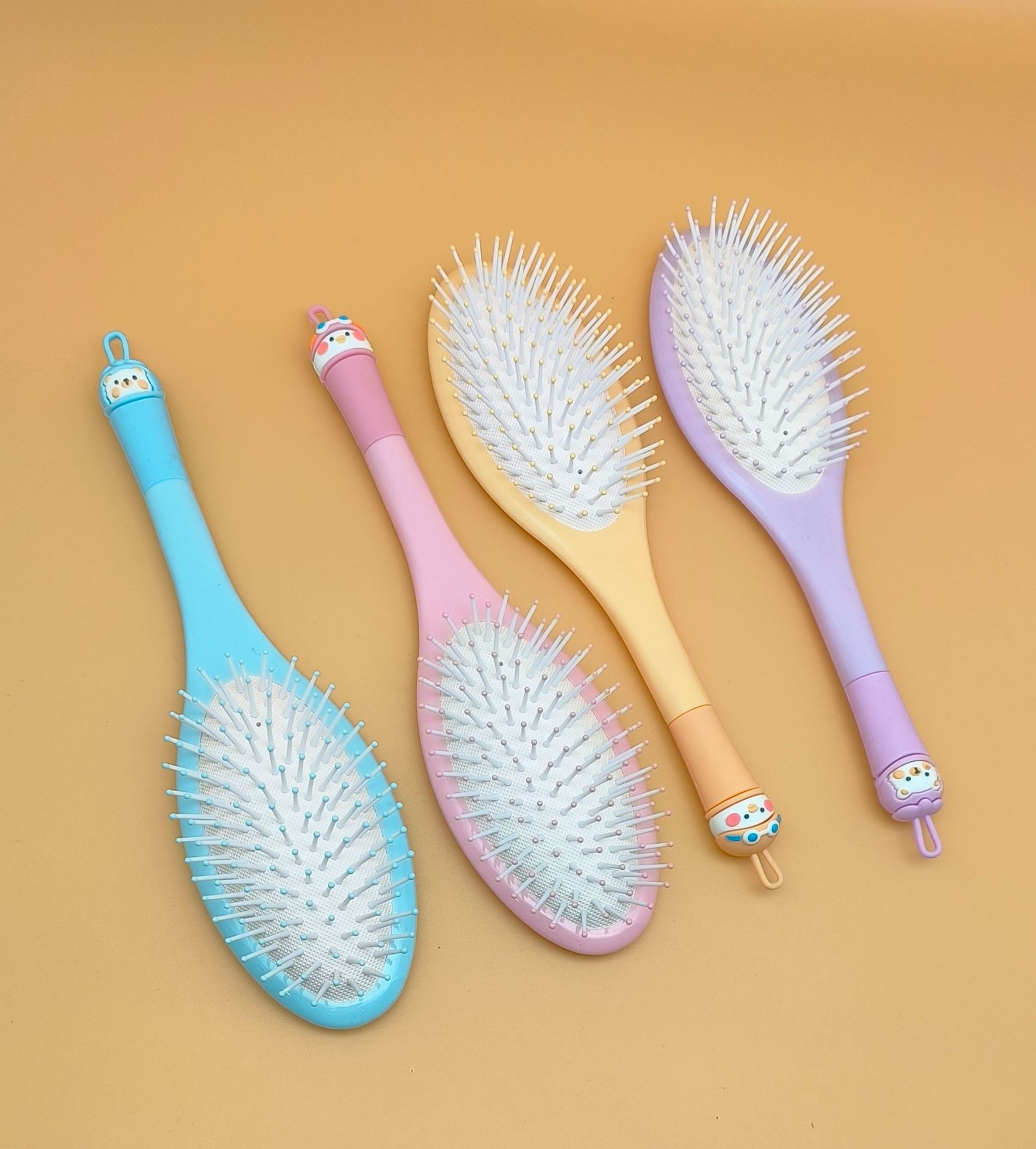 新款女生专用可爱卡通硅胶软头大方头气垫梳 蓬松造型气囊梳圆滚排骨梳 烧烤刷款式梳子详情20
