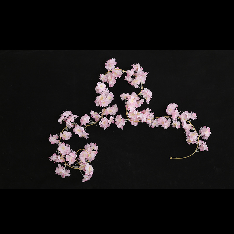 Cherry blossom vines entwined around air conditioning pipes, covering flower stalk trees, simulated peach blossoms, decorative flower vines, artificial flower vines pic 10