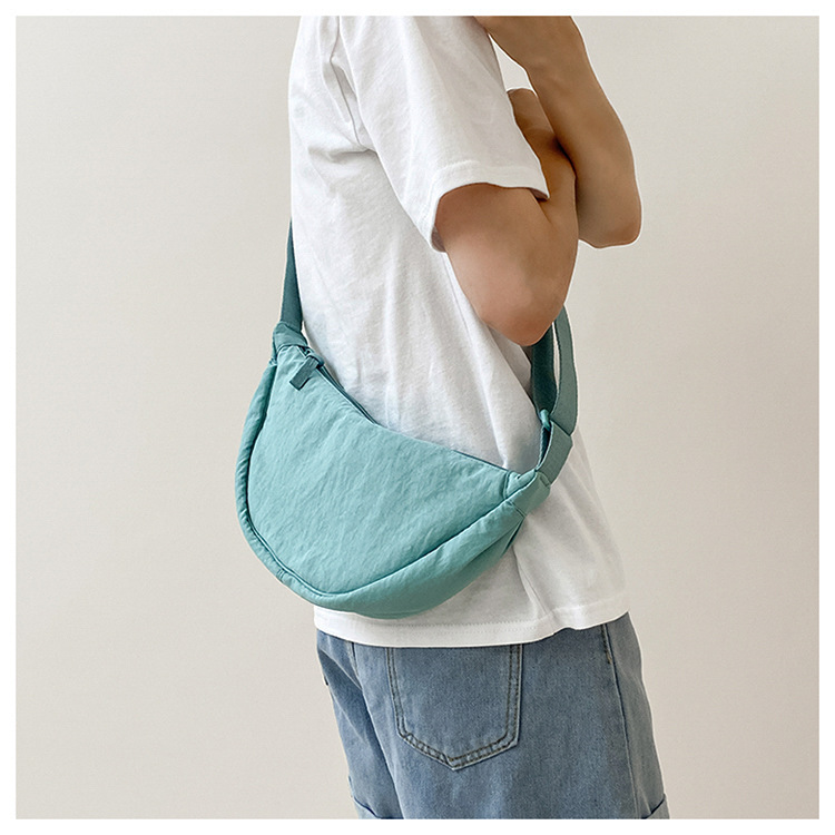 斜挎包女新款单肩包学生女包休闲包运动小包夏季帆布包日系饺子包详情21