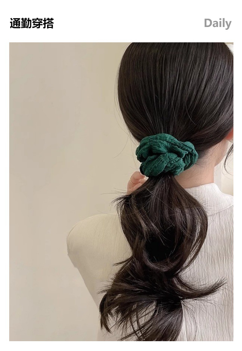 A retro French large intestine hair band for a woman with a simple and elegant ponytail bun. A hair tie, hair band, hair band and hair accessory for a woman pic 14