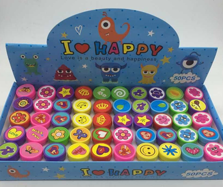 50 plastic toy stamps for children in a color box pic 1
