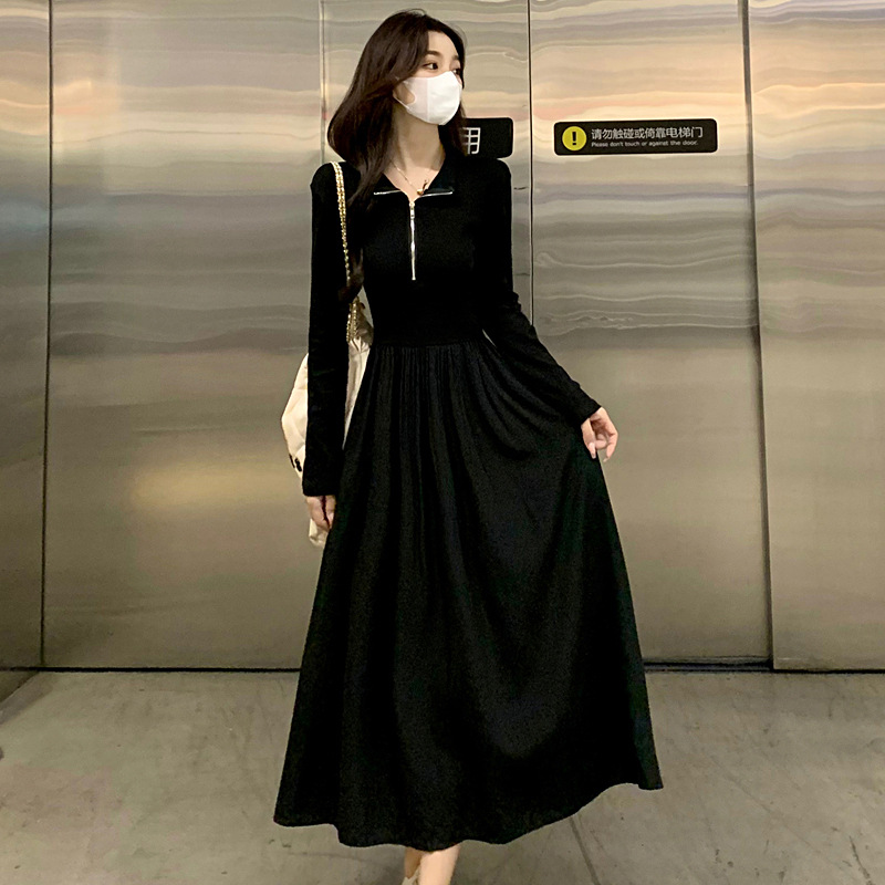 A new black long-sleeved dress for women in the autumn of 2024, featuring a unique semi-zipper design that cinches the waist and accentuates the figure. It is a mid-length dress pic 34