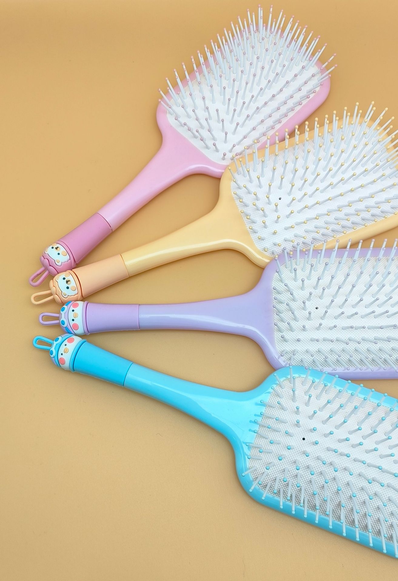 新款女生专用可爱卡通硅胶软头大方头气垫梳 蓬松造型气囊梳圆滚排骨梳 烧烤刷款式梳子详情8