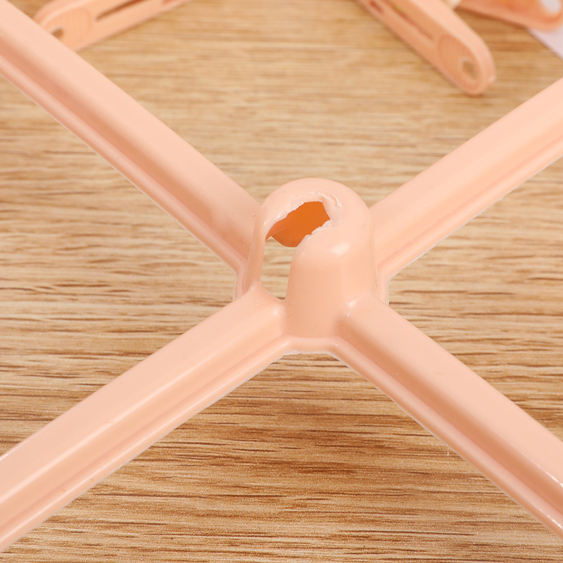 Plastic household round clothes hangers 2-yuan store round clothes hanger stall supply, windproof sock clips, underwear clips wholesale pic 5