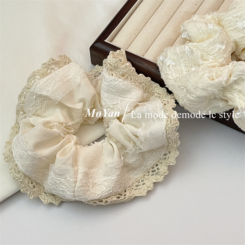 A small chanel-style cream white lace-trimmed large intestine hair band with a high-end feminine look, a bun hair tie, a hair tie, and an early spring hair accessory pic 12