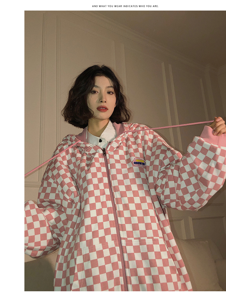 A woman wearing a cardigan with a hood on both sides in a loose pink, niche design with a checkered pattern is particularly stylish pic 30