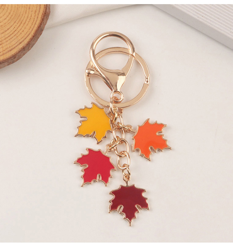 创意珍珠枫叶汽车钥匙扣挂件 简约彩色树叶合金配件耳机套包装饰详情8