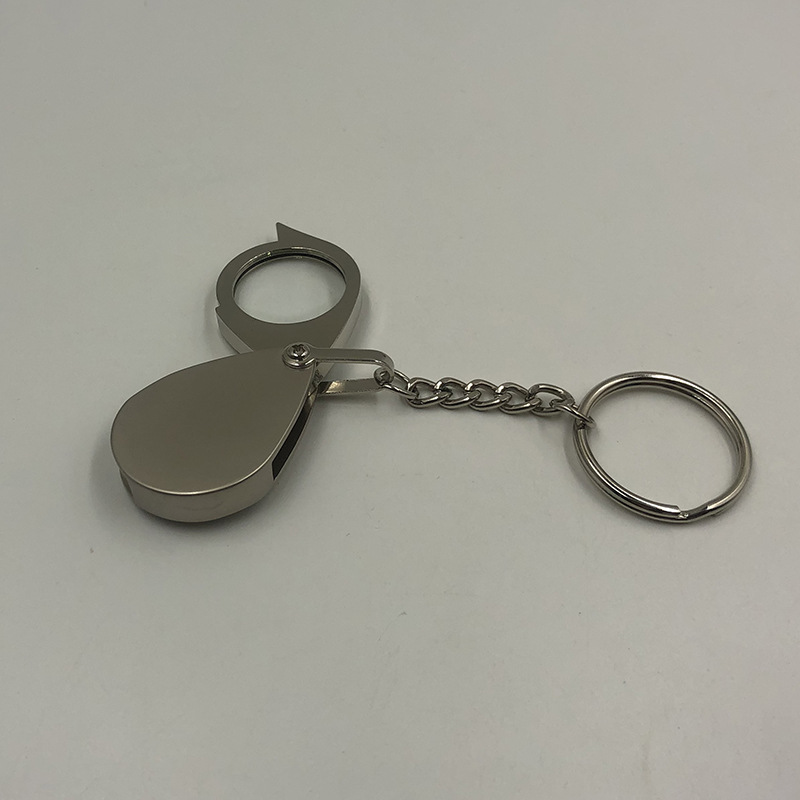 A 30mm diameter metal zinc alloy keychain can hold a portable magnifying glass with a 5x glass lens pic 7