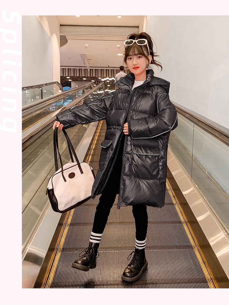 The new cotton-padded jacket for girls in 2023 features a longer winter design with a cinched waist and skirt. It is a plump and stylish cotton-padded jacket for children pic 34
