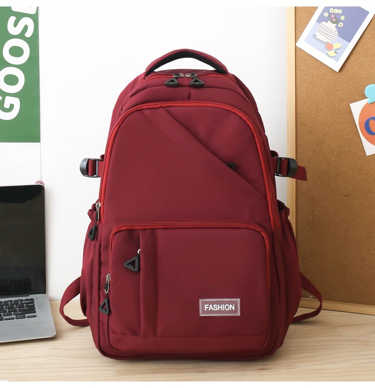 纯色学生书包女批发轻便大容量中大学生双肩包女3-6年级校园背包详情6