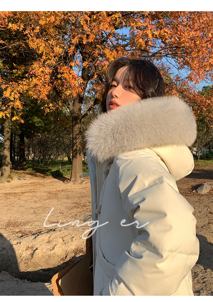 Wholesale of high-end mid-length down jackets for women that reach the knees in 2022, featuring a fashionable design sense and a niche thickened coat pic 29