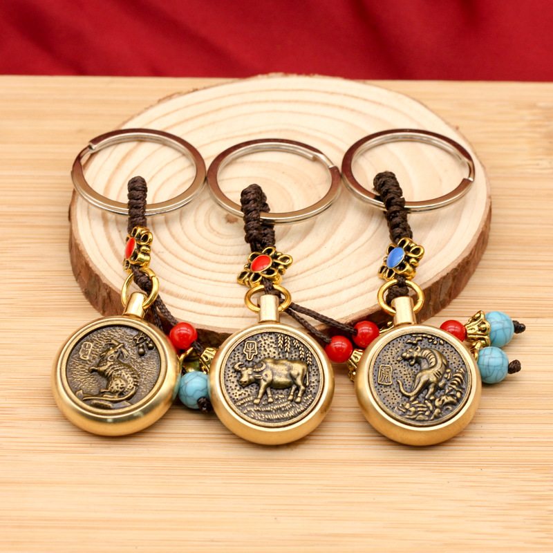 黄铜复古蓝珠绳中式生肖旋转创意钥匙扣配件小礼品小汽车挂件批发详情3