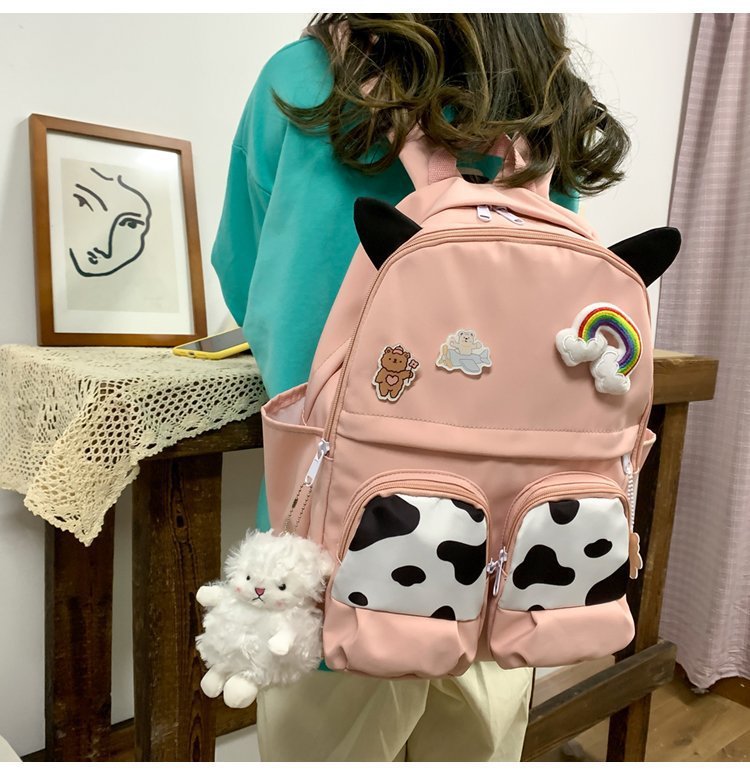 Japanese-style ins campus school style, fresh and cute, cute cow with earbuds, soft girl schoolbag, funny student backpack pic 14