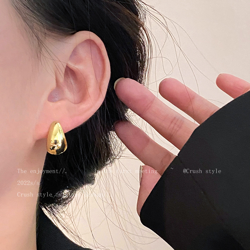 Wholesale of popular brushed frosted stud earrings for women with a light luxury and high-end InS-style, golden round stud earrings in the style of love beans pic 14