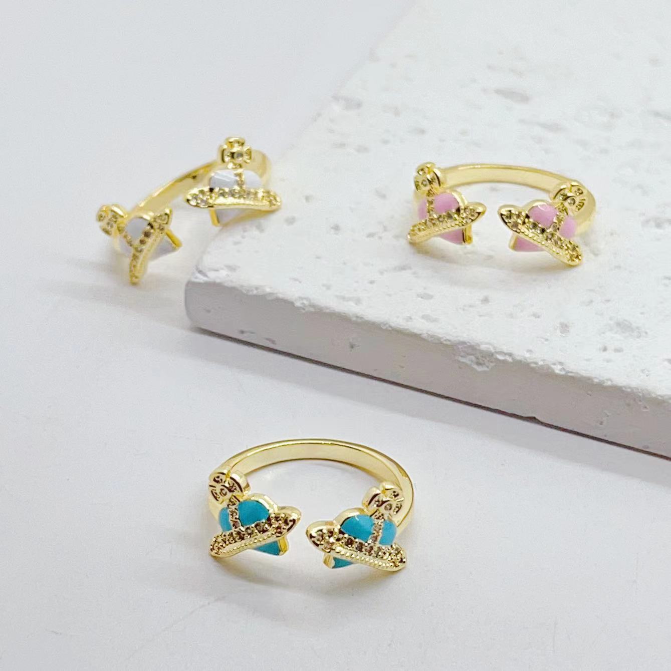 This cross-border e-commerce product features a unique and niche design for women. The oil drop ring has an adjustable opening. It is an event ring with 18K copper plating pic 2