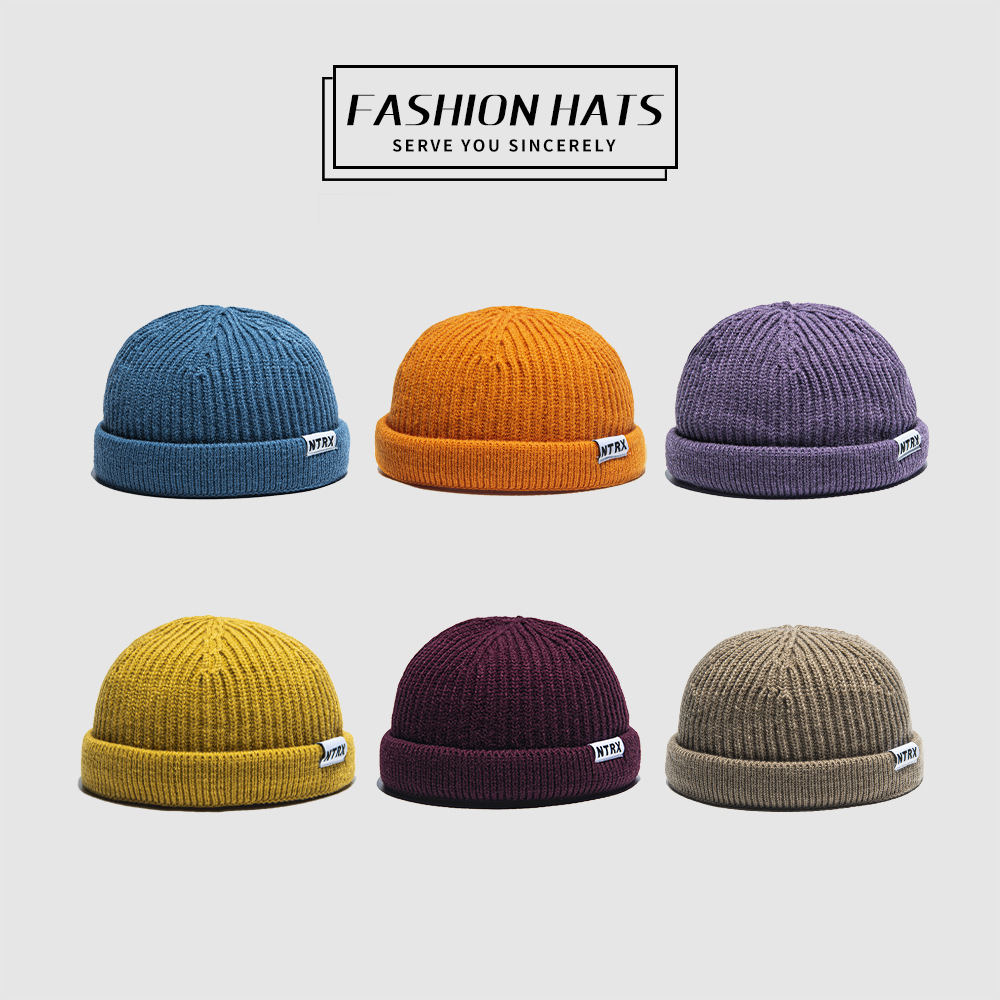 For the autumn and winter of 2021, men and women are wearing Korean-style outdoor casual hats without brims, with rolled edges and round top warp knitted caps pic 1
