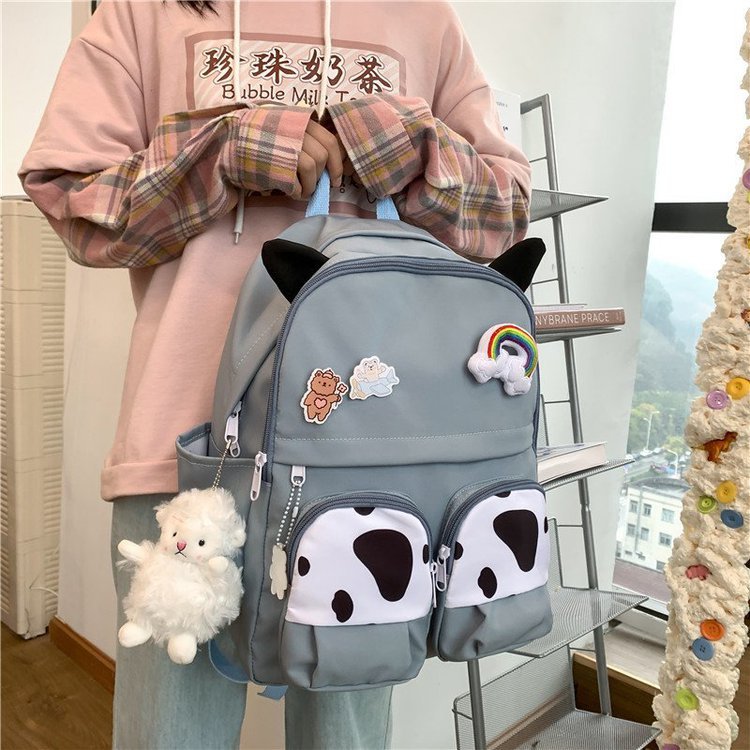 Japanese-style ins campus school style, fresh and cute, cute cow with earbuds, soft girl schoolbag, funny student backpack pic 109