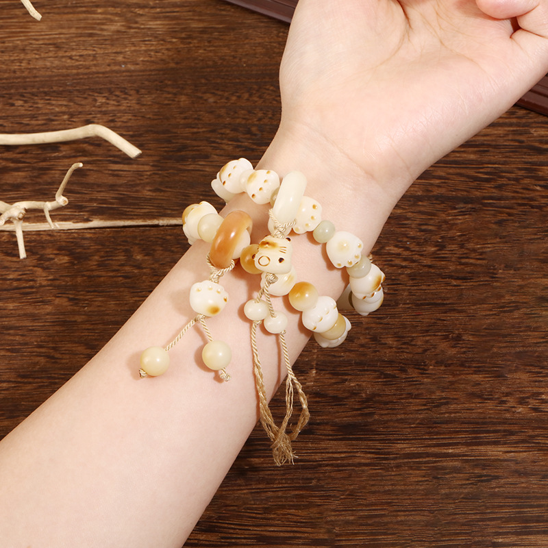 Japanese-style charcoal-burned cat paw running ring bracelet, retro white jade Bodhi seed text play bracelet, cute hand-held Buddhist prayer beads bracelet for a girl pic 2