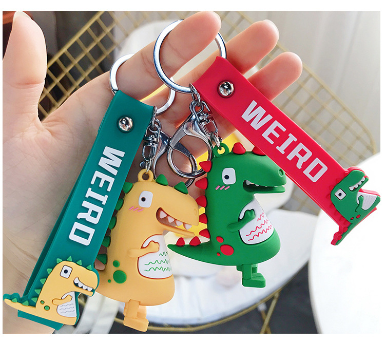 Wholesale of trendy new silicone dinosaur keychains, cute female cartoon figurines, couple key chains, bags, pendants and gifts pic 12