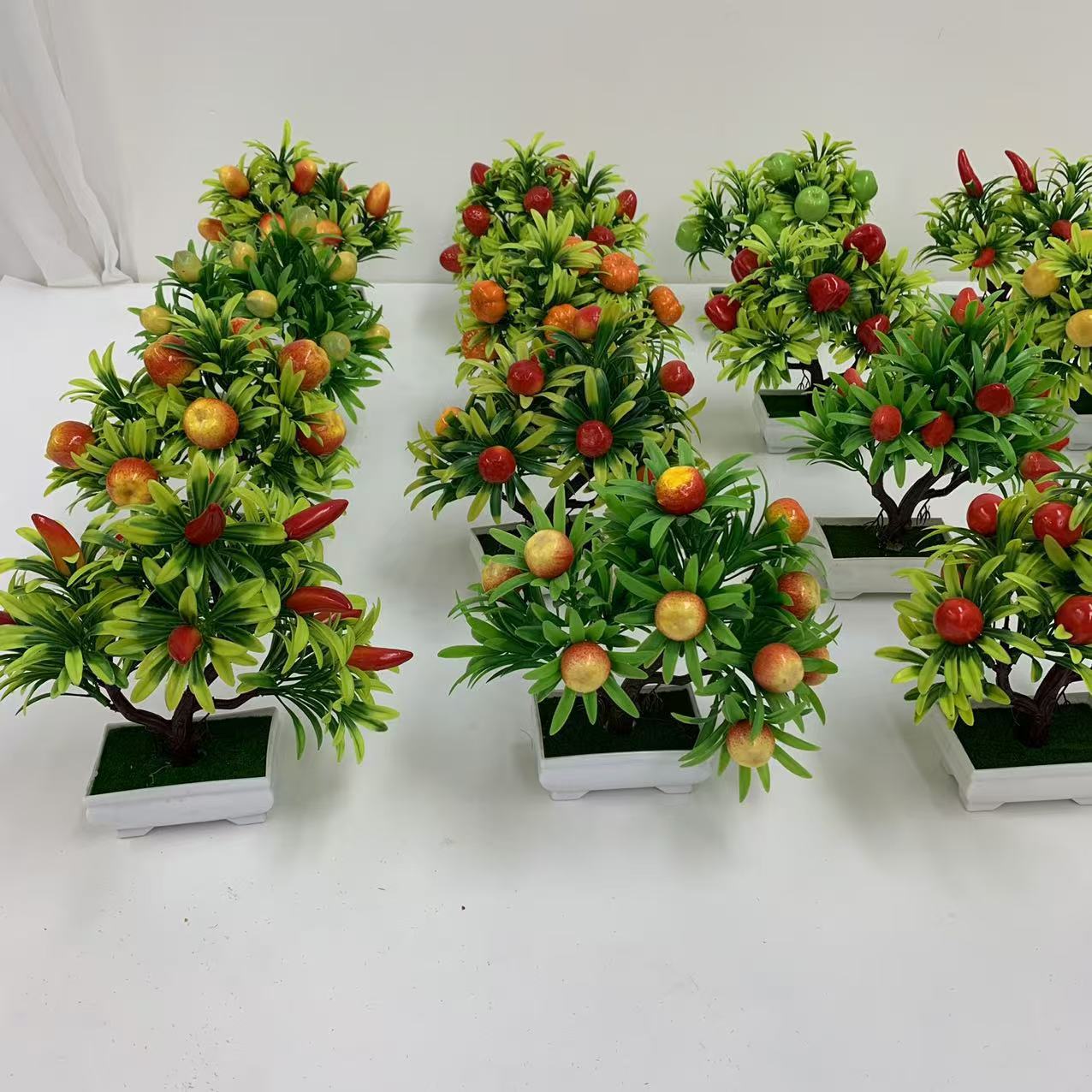 A comprehensive collection of simulated fruit potted plants and bonsai, including red apples, pomegranates, strawberries, oranges, peaches, mangoes, bananas, and red peppers for decoration pic 24