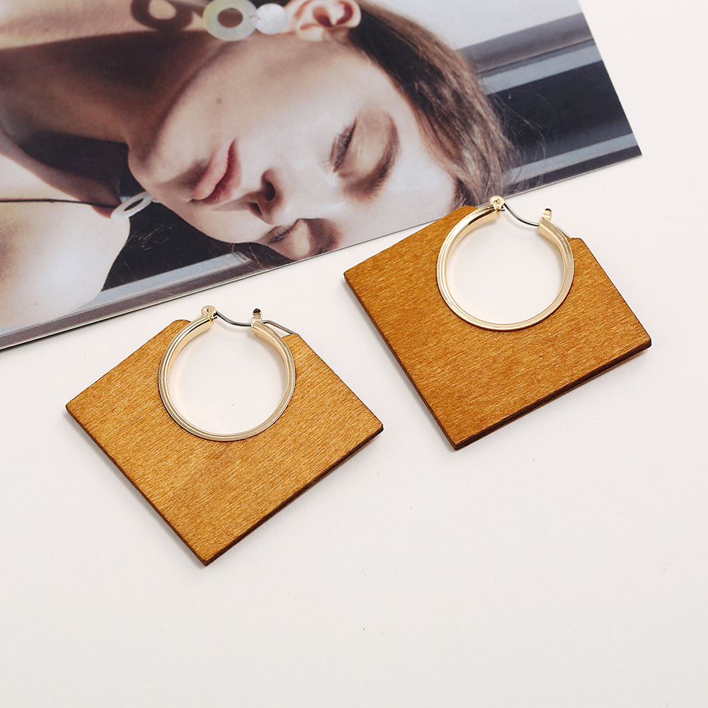Cross-border exclusive European and American new ear rings, creative geometric classic solid color solid wood diamond-shaped hollowed-out alloy earrings and earrings pic 17